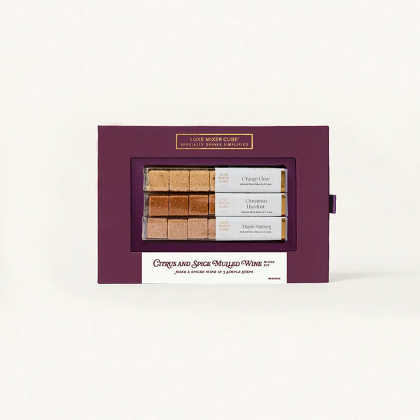 Set of mulled wine cubes in a purple box on a white background