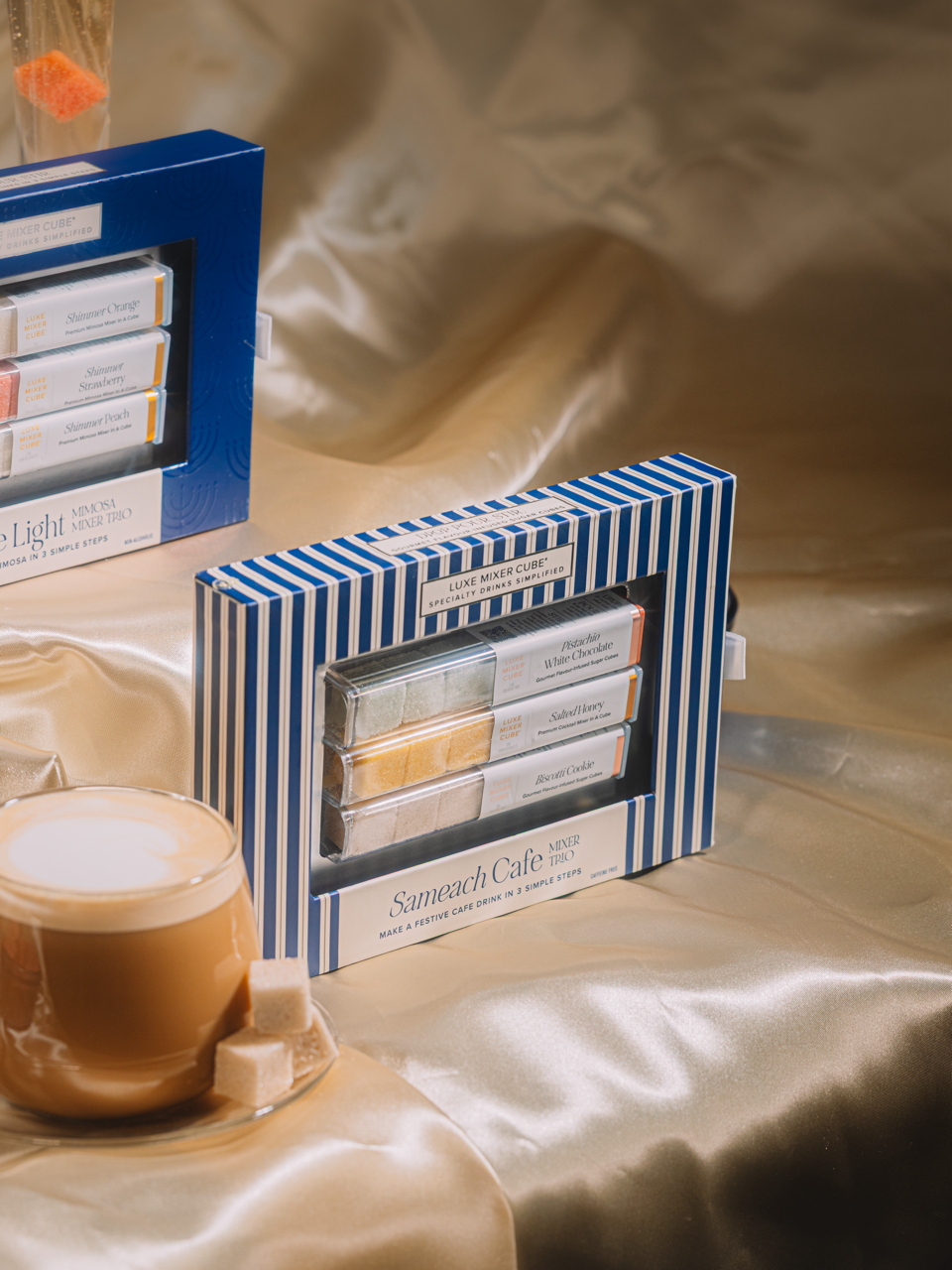 Packaged tea set with a cup of coffee on a textured surface