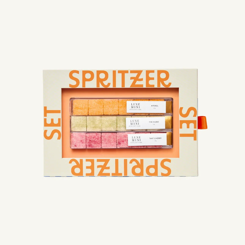 Spritzer set packaging with colorful bars inside on a white background