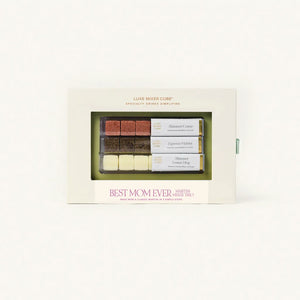 Gift set for 'Best Mom Ever' with various items in a box on a white background