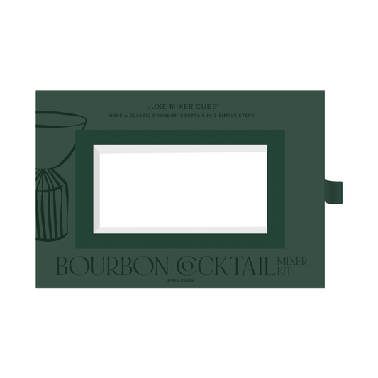 Green packaging for a bourbon cocktail mixer kit with text on a white background