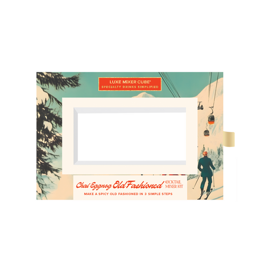 Luxe Mixer Cube packaging with vintage-style illustration of a skier and trees.