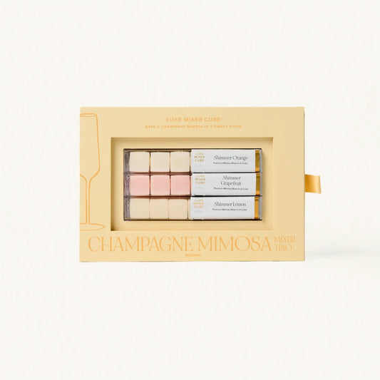 Champagne Mimosa makeup trio packaging on a light beige background