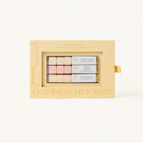 Champagne Mimosa makeup trio packaging on a light beige background