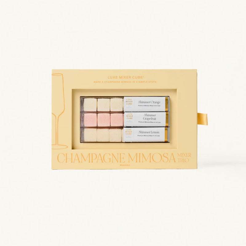 Champagne Mimosa makeup trio packaging on a light beige background