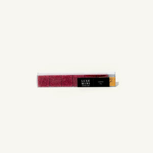 Luxe Mini lip balm packaging on a white background