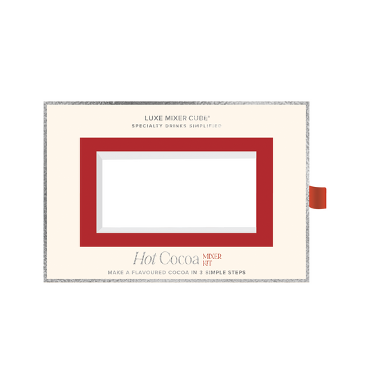 Hot cocoa mixer cube packaging with a red frame on a white background
