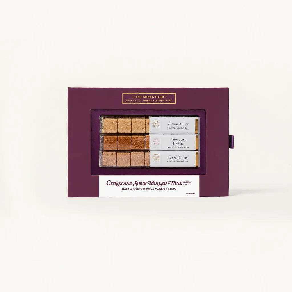 Set of mulled wine cubes in a purple box on a white background
