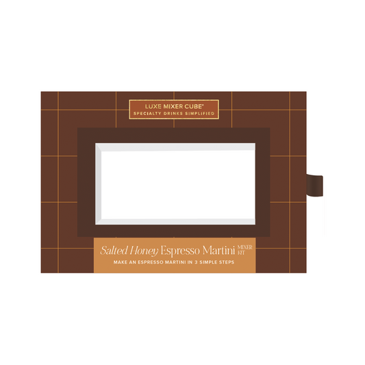 Brown packaging box with a clear window for displaying contents, featuring text about a salted honey espresso martini.