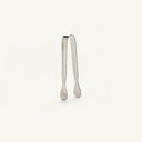 Metallic tongs on a white background