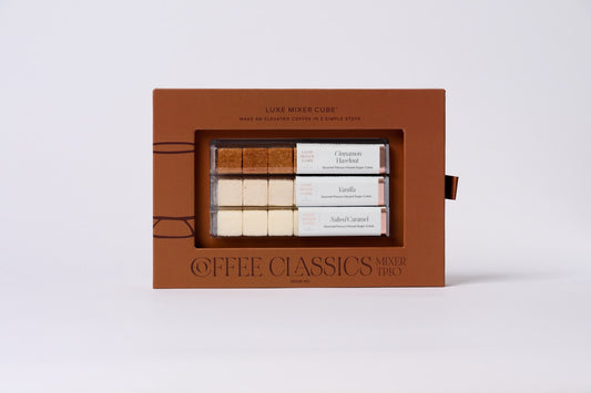 Brown packaging box containing coffee classics on a white background