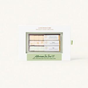 Packaged tea set with 'Luxe Mixer Cube' branding on a white background
